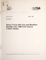 Heavy truck with cab and modified bumper into 1988 Ford Taurus 4door sedan